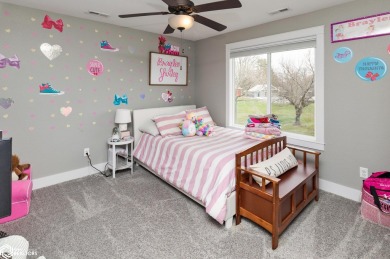SHOW STOPPER!! Welcome to 1150 Cardinal Drive, a beautifully on Tournament Club of Iowa in Iowa - for sale on GolfHomes.com, golf home, golf lot