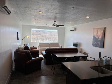 Tucked inside the Villas at Sand Hollow, this thoughtfully on Sand Hollow Golf Resort in Utah - for sale on GolfHomes.com, golf home, golf lot