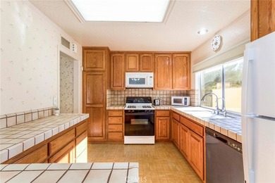 Welcome Home to Easy Living in a Vibrant 55+ Community!  Step on Friendly Valley Golf Course in California - for sale on GolfHomes.com, golf home, golf lot