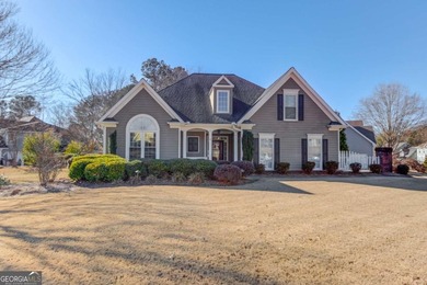 Welcome home to this inviting 4-bedroom, 2.5-bath beauty located on Hamilton Mill Golf Club in Georgia - for sale on GolfHomes.com, golf home, golf lot