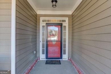Welcome home to this inviting 4-bedroom, 2.5-bath beauty located on Hamilton Mill Golf Club in Georgia - for sale on GolfHomes.com, golf home, golf lot