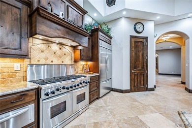 Nearly 6,000 Sq Ft of Purposeful Luxury with Dual Primary Suites on Laughlin Ranch Golf Club in Arizona - for sale on GolfHomes.com, golf home, golf lot