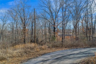 Tucked away at the end of a quiet cul-de-sac in Bella Vista's on Bella Vista Country Club - Highlands in Arkansas - for sale on GolfHomes.com, golf home, golf lot