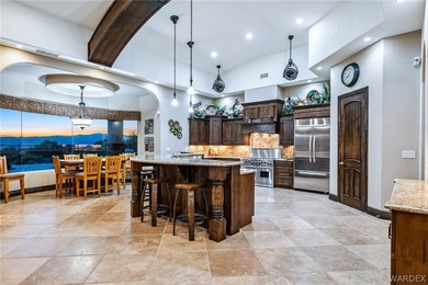 Nearly 6,000 Sq Ft of Purposeful Luxury with Dual Primary Suites on Laughlin Ranch Golf Club in Arizona - for sale on GolfHomes.com, golf home, golf lot