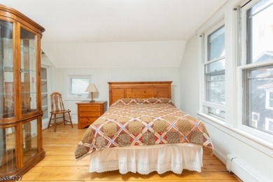 Step into the timeless charm of this Victorian gem in the heart on Mt Tabor Country Club in New Jersey - for sale on GolfHomes.com, golf home, golf lot
