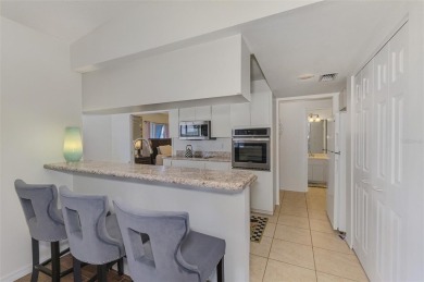 Charming 3-bedroom, 2-bathroom, canal-front home in the highly on Pinemoor West Golf Club in Florida - for sale on GolfHomes.com, golf home, golf lot
