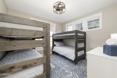 Watch video! This premium 4-bedroom, 3.25-bath townhome offers a on Grand Elk Ranch and Club in Colorado - for sale on GolfHomes.com, golf home, golf lot