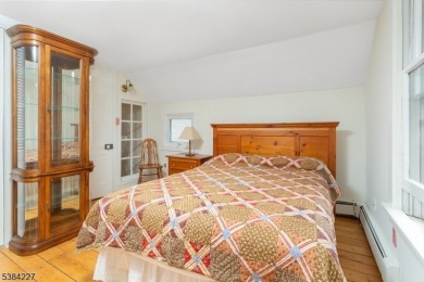 Step into the timeless charm of this Victorian gem in the heart on Mt Tabor Country Club in New Jersey - for sale on GolfHomes.com, golf home, golf lot