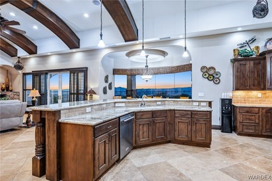 Nearly 6,000 Sq Ft of Purposeful Luxury with Dual Primary Suites on Laughlin Ranch Golf Club in Arizona - for sale on GolfHomes.com, golf home, golf lot