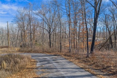 Tucked away at the end of a quiet cul-de-sac in Bella Vista's on Bella Vista Country Club - Highlands in Arkansas - for sale on GolfHomes.com, golf home, golf lot