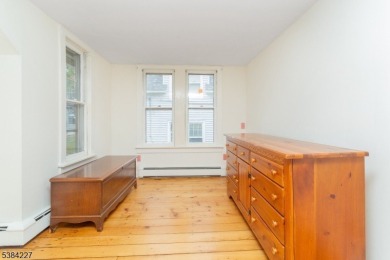 Step into the timeless charm of this Victorian gem in the heart on Mt Tabor Country Club in New Jersey - for sale on GolfHomes.com, golf home, golf lot