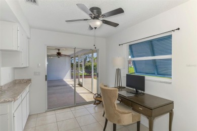 Charming 3-bedroom, 2-bathroom, canal-front home in the highly on Pinemoor West Golf Club in Florida - for sale on GolfHomes.com, golf home, golf lot