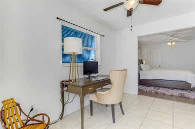 Charming 3-bedroom, 2-bathroom, canal-front home in the highly on Pinemoor West Golf Club in Florida - for sale on GolfHomes.com, golf home, golf lot