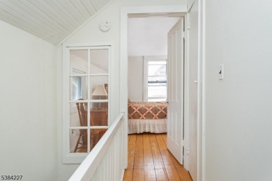 Step into the timeless charm of this Victorian gem in the heart on Mt Tabor Country Club in New Jersey - for sale on GolfHomes.com, golf home, golf lot