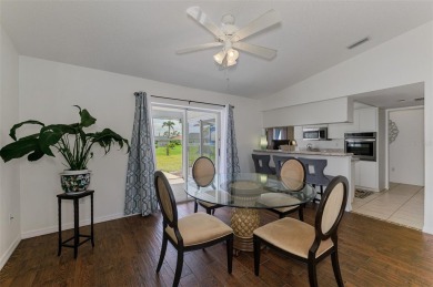 Charming 3-bedroom, 2-bathroom, canal-front home in the highly on Pinemoor West Golf Club in Florida - for sale on GolfHomes.com, golf home, golf lot