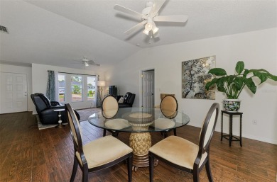 Charming 3-bedroom, 2-bathroom, canal-front home in the highly on Pinemoor West Golf Club in Florida - for sale on GolfHomes.com, golf home, golf lot