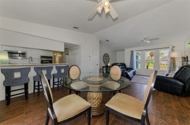 Charming 3-bedroom, 2-bathroom, canal-front home in the highly on Pinemoor West Golf Club in Florida - for sale on GolfHomes.com, golf home, golf lot