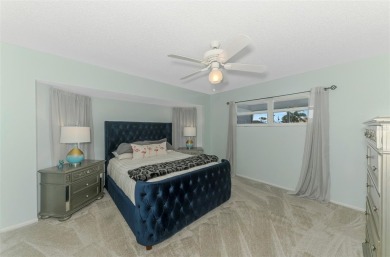Charming 3-bedroom, 2-bathroom, canal-front home in the highly on Pinemoor West Golf Club in Florida - for sale on GolfHomes.com, golf home, golf lot