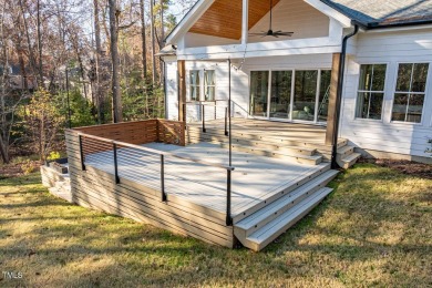 This modern farmhouse is a dream for anyone who loves both style on The Preserve At Jordan Lake Golf Club in North Carolina - for sale on GolfHomes.com, golf home, golf lot