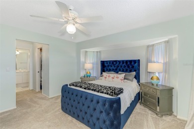 Charming 3-bedroom, 2-bathroom, canal-front home in the highly on Pinemoor West Golf Club in Florida - for sale on GolfHomes.com, golf home, golf lot