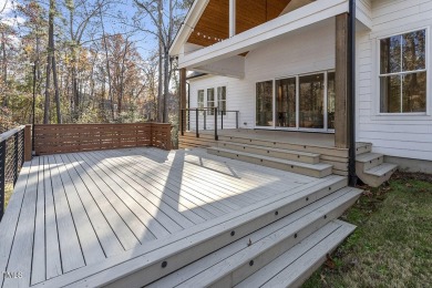 This modern farmhouse is a dream for anyone who loves both style on The Preserve At Jordan Lake Golf Club in North Carolina - for sale on GolfHomes.com, golf home, golf lot