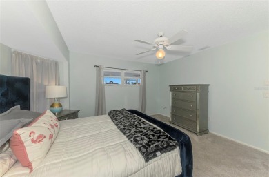 Charming 3-bedroom, 2-bathroom, canal-front home in the highly on Pinemoor West Golf Club in Florida - for sale on GolfHomes.com, golf home, golf lot