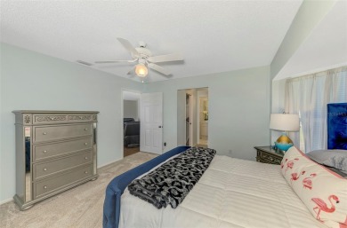 Charming 3-bedroom, 2-bathroom, canal-front home in the highly on Pinemoor West Golf Club in Florida - for sale on GolfHomes.com, golf home, golf lot