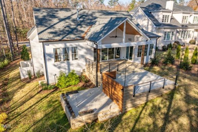 This modern farmhouse is a dream for anyone who loves both style on The Preserve At Jordan Lake Golf Club in North Carolina - for sale on GolfHomes.com, golf home, golf lot