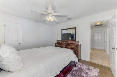 Charming 3-bedroom, 2-bathroom, canal-front home in the highly on Pinemoor West Golf Club in Florida - for sale on GolfHomes.com, golf home, golf lot