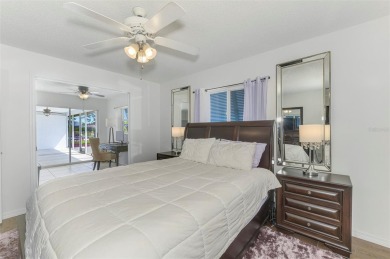 Charming 3-bedroom, 2-bathroom, canal-front home in the highly on Pinemoor West Golf Club in Florida - for sale on GolfHomes.com, golf home, golf lot