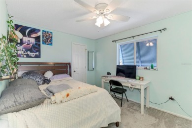 Charming 3-bedroom, 2-bathroom, canal-front home in the highly on Pinemoor West Golf Club in Florida - for sale on GolfHomes.com, golf home, golf lot
