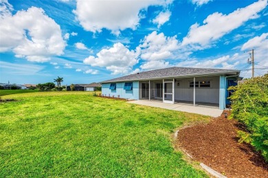 Charming 3-bedroom, 2-bathroom, canal-front home in the highly on Pinemoor West Golf Club in Florida - for sale on GolfHomes.com, golf home, golf lot