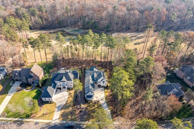 This modern farmhouse is a dream for anyone who loves both style on The Preserve At Jordan Lake Golf Club in North Carolina - for sale on GolfHomes.com, golf home, golf lot