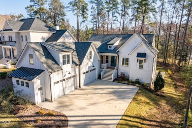 This modern farmhouse is a dream for anyone who loves both style on The Preserve At Jordan Lake Golf Club in North Carolina - for sale on GolfHomes.com, golf home, golf lot