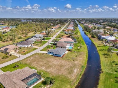 Charming 3-bedroom, 2-bathroom, canal-front home in the highly on Pinemoor West Golf Club in Florida - for sale on GolfHomes.com, golf home, golf lot