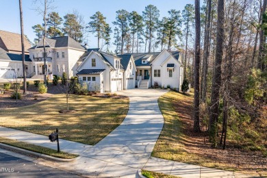 This modern farmhouse is a dream for anyone who loves both style on The Preserve At Jordan Lake Golf Club in North Carolina - for sale on GolfHomes.com, golf home, golf lot