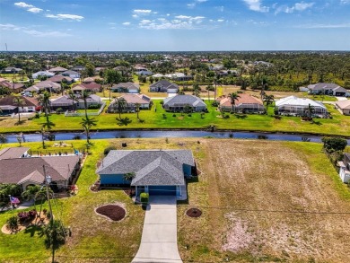 Charming 3-bedroom, 2-bathroom, canal-front home in the highly on Pinemoor West Golf Club in Florida - for sale on GolfHomes.com, golf home, golf lot