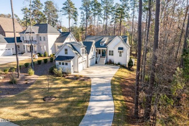 This modern farmhouse is a dream for anyone who loves both style on The Preserve At Jordan Lake Golf Club in North Carolina - for sale on GolfHomes.com, golf home, golf lot