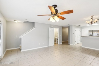 Enjoy low-maintenance living in this two-story townhome located on Golf Club At Fleming Island in Florida - for sale on GolfHomes.com, golf home, golf lot