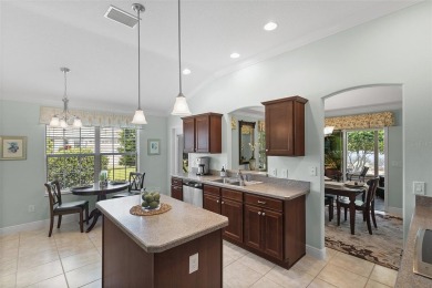 Welcome Home to this stunning Stretched Mandevilla model in the on The Links of Spruce Creek in Florida - for sale on GolfHomes.com, golf home, golf lot