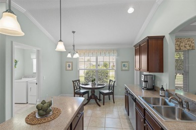 Welcome Home to this stunning Stretched Mandevilla model in the on The Links of Spruce Creek in Florida - for sale on GolfHomes.com, golf home, golf lot