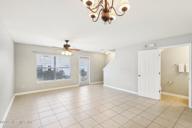 Enjoy low-maintenance living in this two-story townhome located on Golf Club At Fleming Island in Florida - for sale on GolfHomes.com, golf home, golf lot