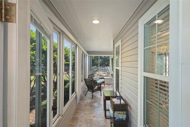 Welcome Home to this stunning Stretched Mandevilla model in the on The Links of Spruce Creek in Florida - for sale on GolfHomes.com, golf home, golf lot