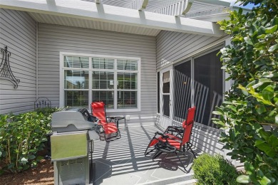 Welcome Home to this stunning Stretched Mandevilla model in the on The Links of Spruce Creek in Florida - for sale on GolfHomes.com, golf home, golf lot