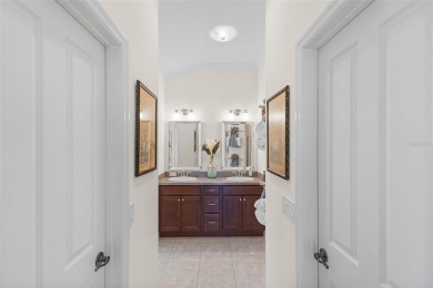 Welcome Home to this stunning Stretched Mandevilla model in the on The Links of Spruce Creek in Florida - for sale on GolfHomes.com, golf home, golf lot