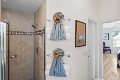 Welcome Home to this stunning Stretched Mandevilla model in the on The Links of Spruce Creek in Florida - for sale on GolfHomes.com, golf home, golf lot