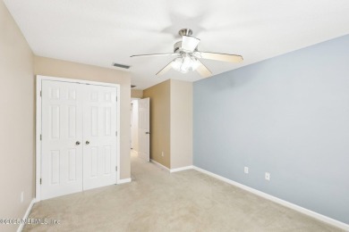 Enjoy low-maintenance living in this two-story townhome located on Golf Club At Fleming Island in Florida - for sale on GolfHomes.com, golf home, golf lot