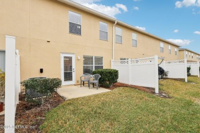 Enjoy low-maintenance living in this two-story townhome located on Golf Club At Fleming Island in Florida - for sale on GolfHomes.com, golf home, golf lot