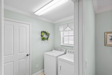 Welcome Home to this stunning Stretched Mandevilla model in the on The Links of Spruce Creek in Florida - for sale on GolfHomes.com, golf home, golf lot