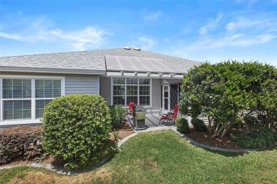 Welcome Home to this stunning Stretched Mandevilla model in the on The Links of Spruce Creek in Florida - for sale on GolfHomes.com, golf home, golf lot